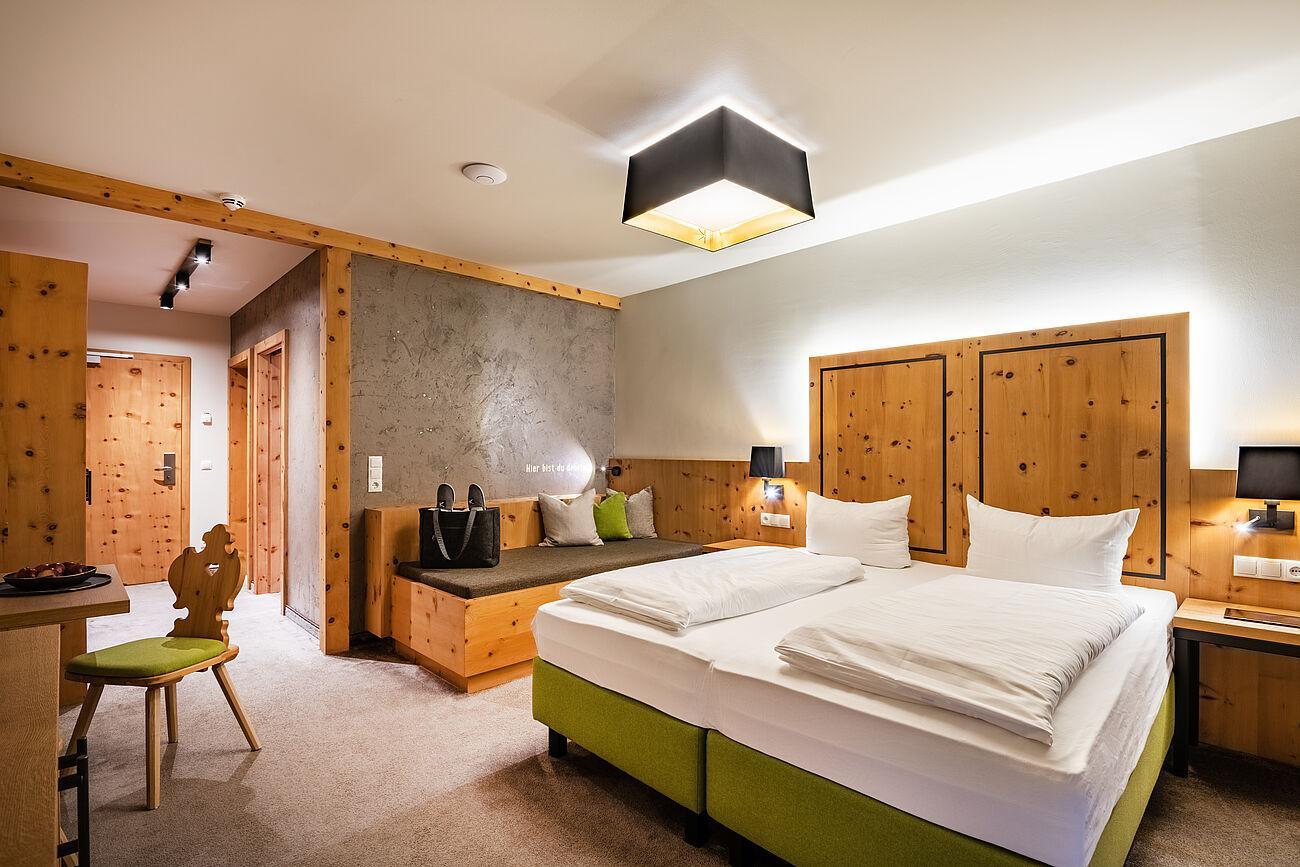 Das einladende Bett im Premium Doppelzimmer